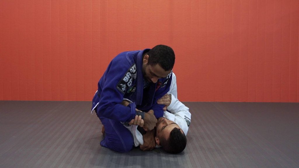 Submission 7. X Choke From Mount Into Wrist Lock